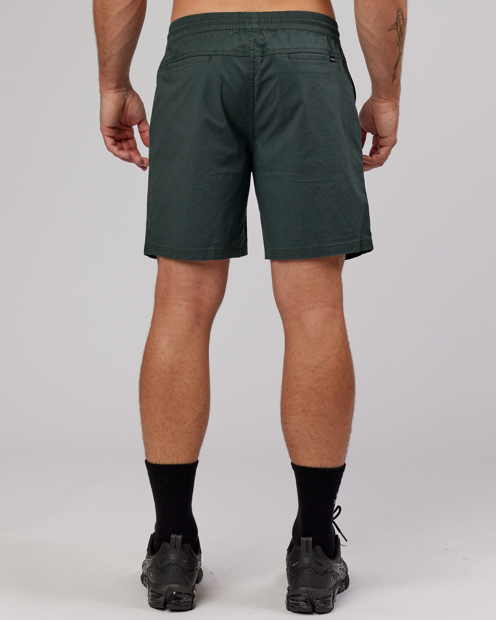 Model wearing Daily Short - Vital Green