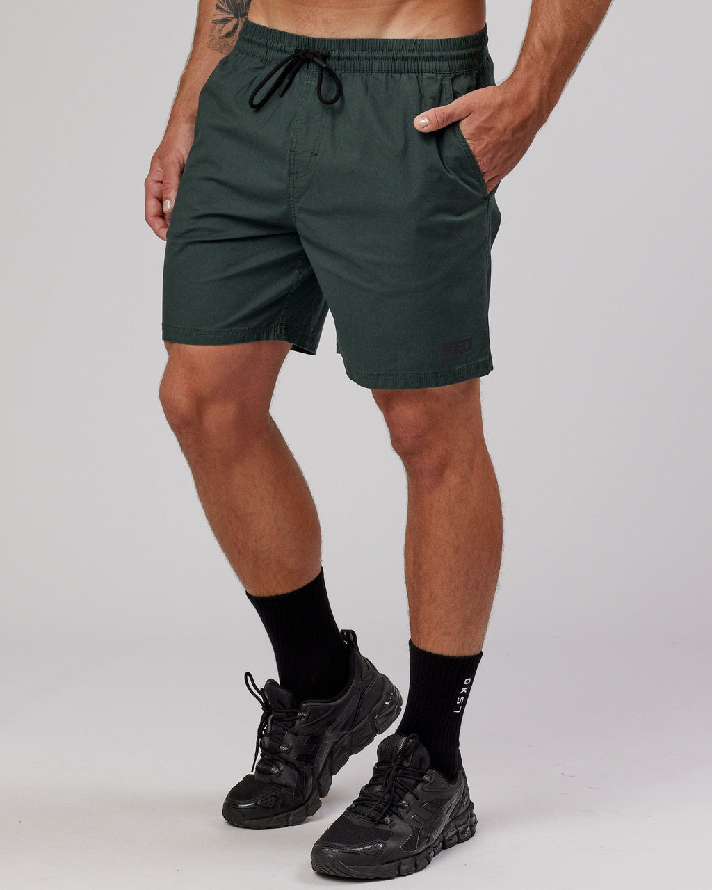 Model wearing Daily Short - Vital Green