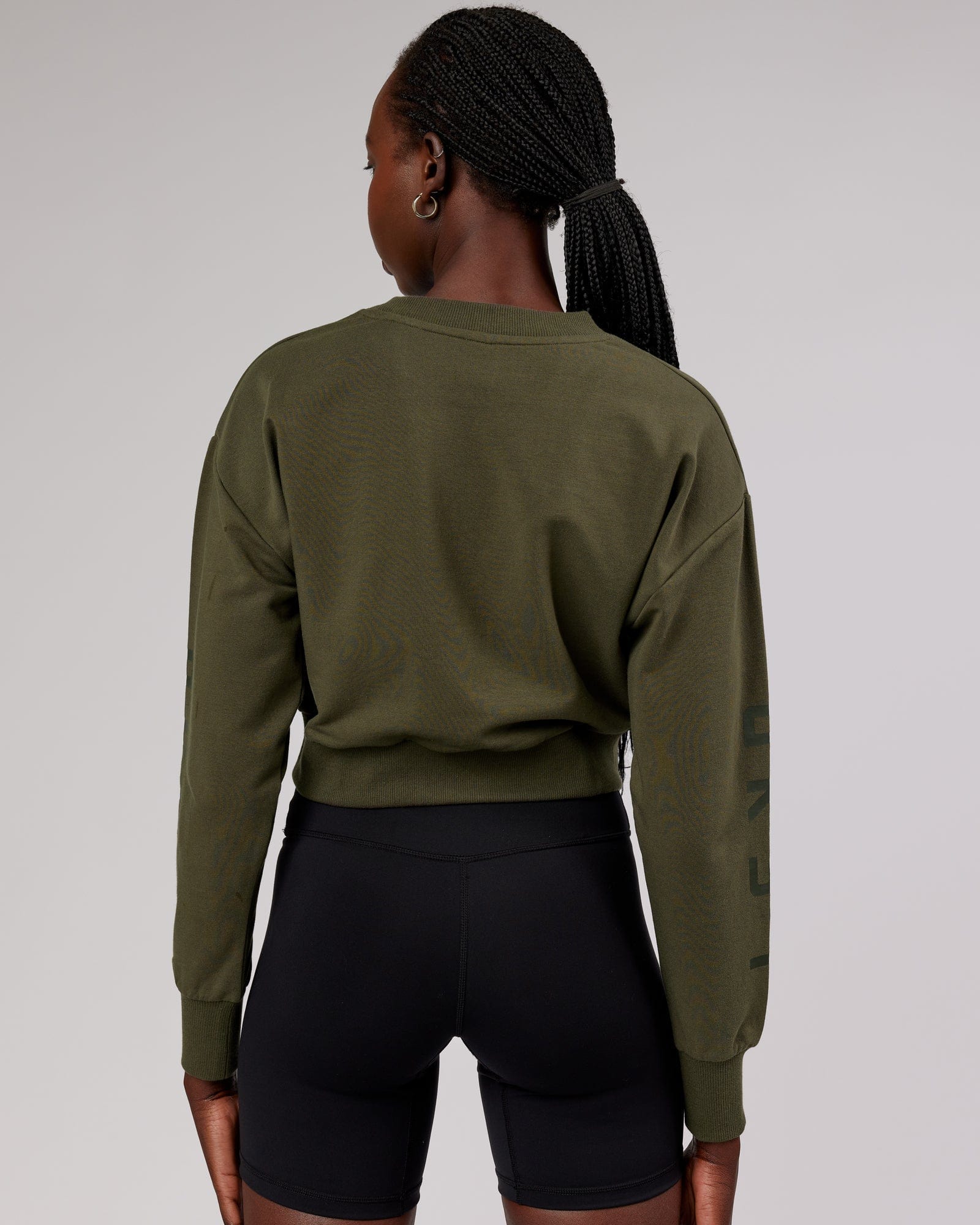 Model wearing Defender FLXFleece Sweater - Forest Night