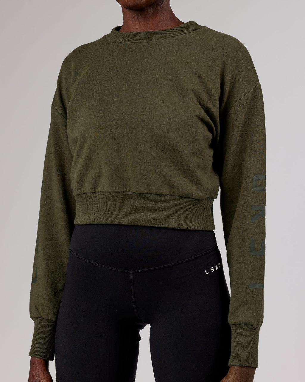 Model wearing Defender FLXFleece Sweater - Forest Night