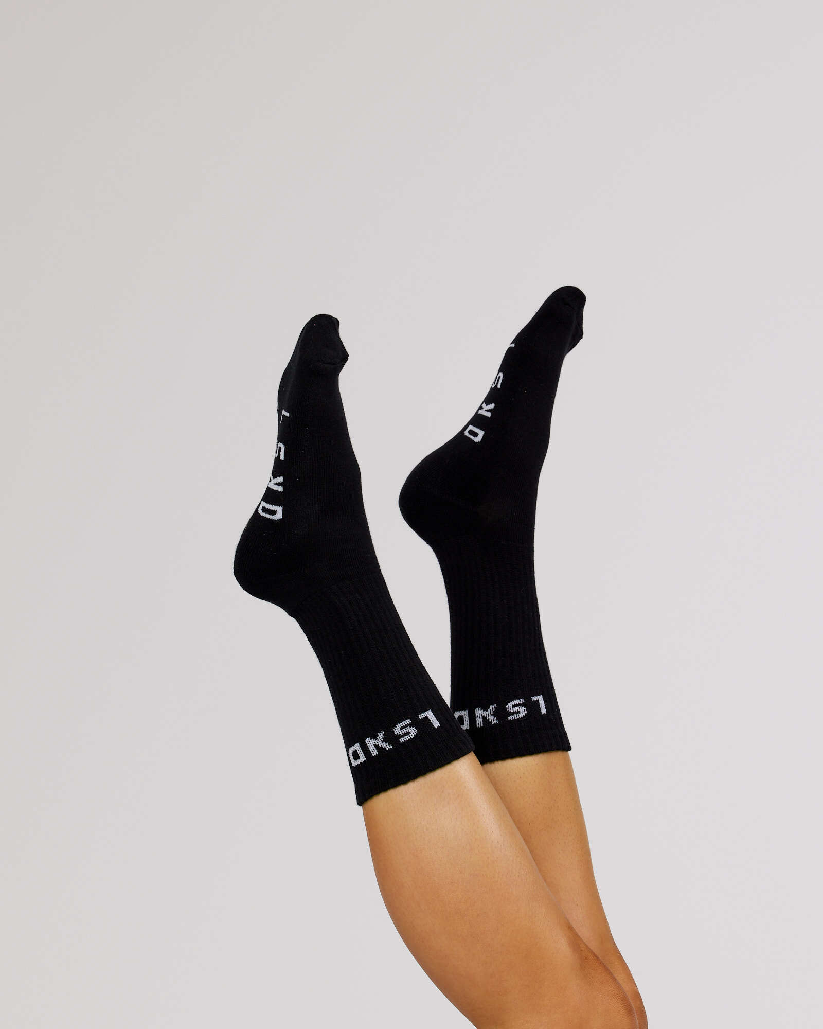 Model wearing Demo Crew Sock - Black