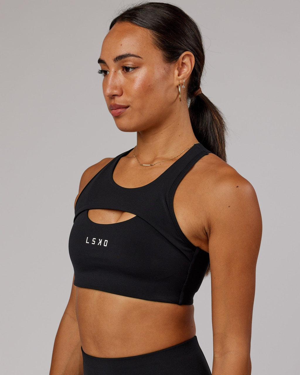 Model wearing Driven Sports Bra - Black