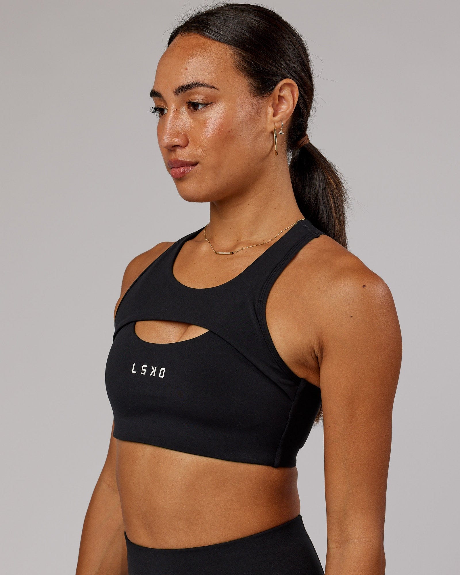Model wearing Driven Sports Bra - Black