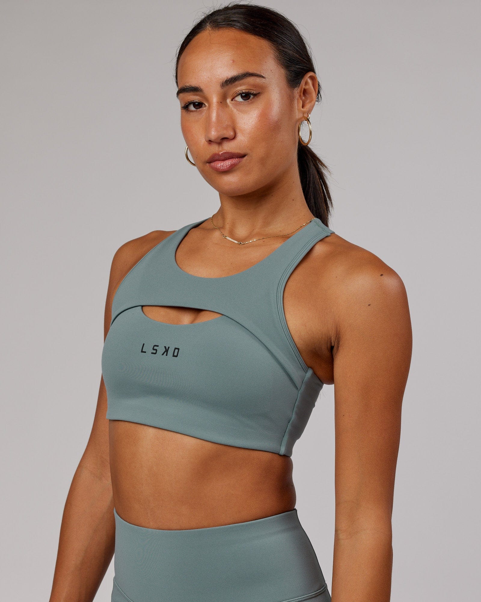 Model wearing Driven Sports Bra - Eclipse