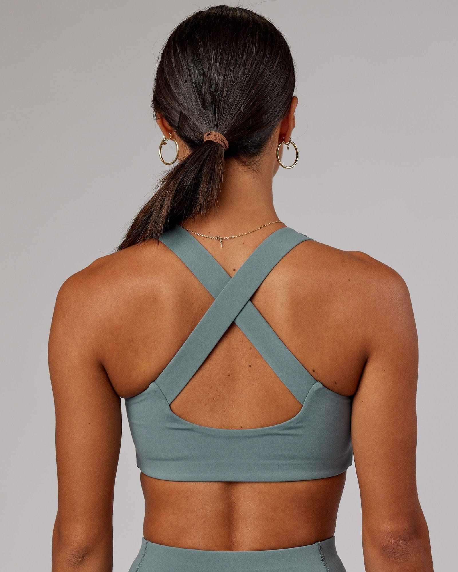 Model wearing Driven Sports Bra - Eclipse