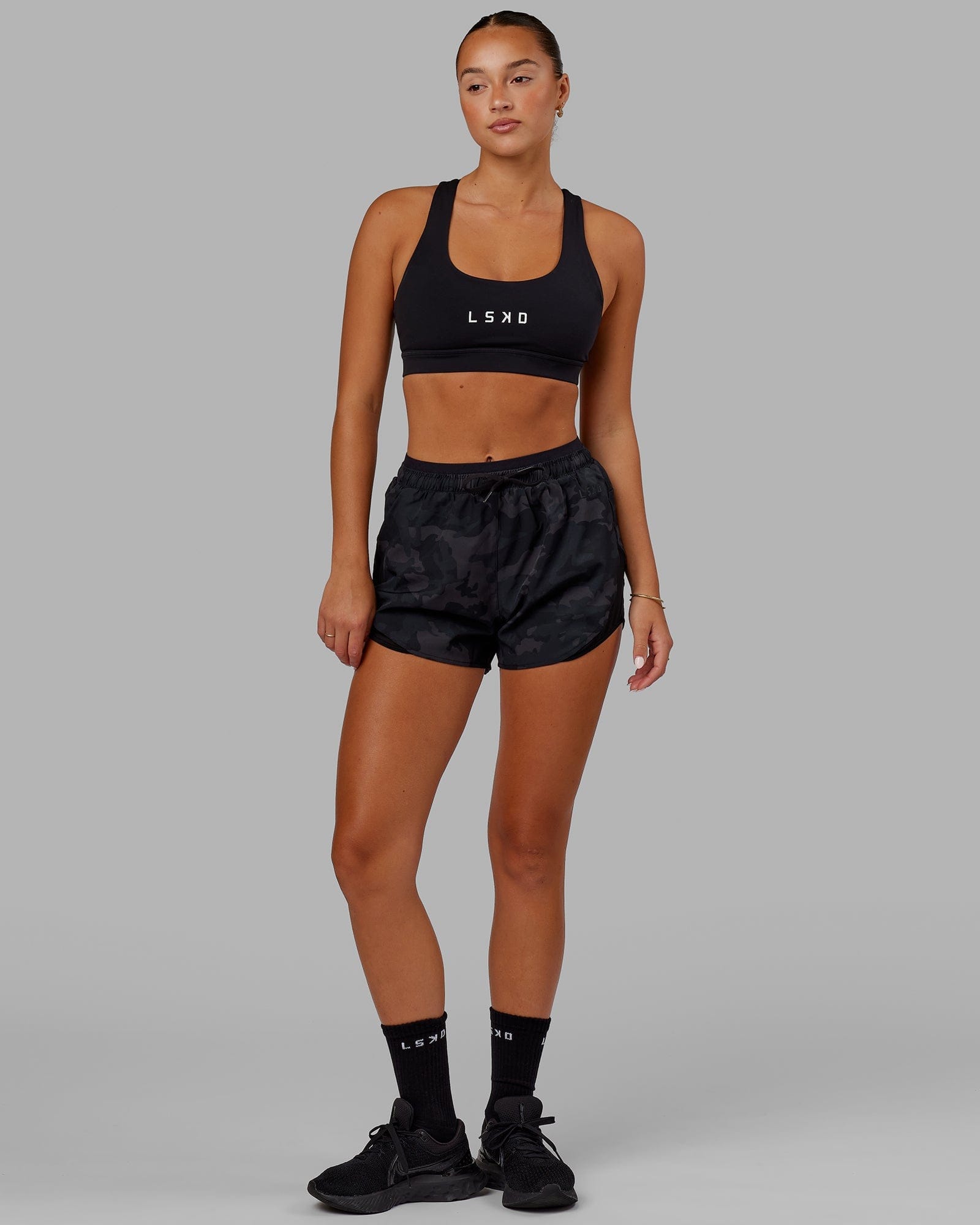 Model wearing Dynamic Run Short - Black Camo