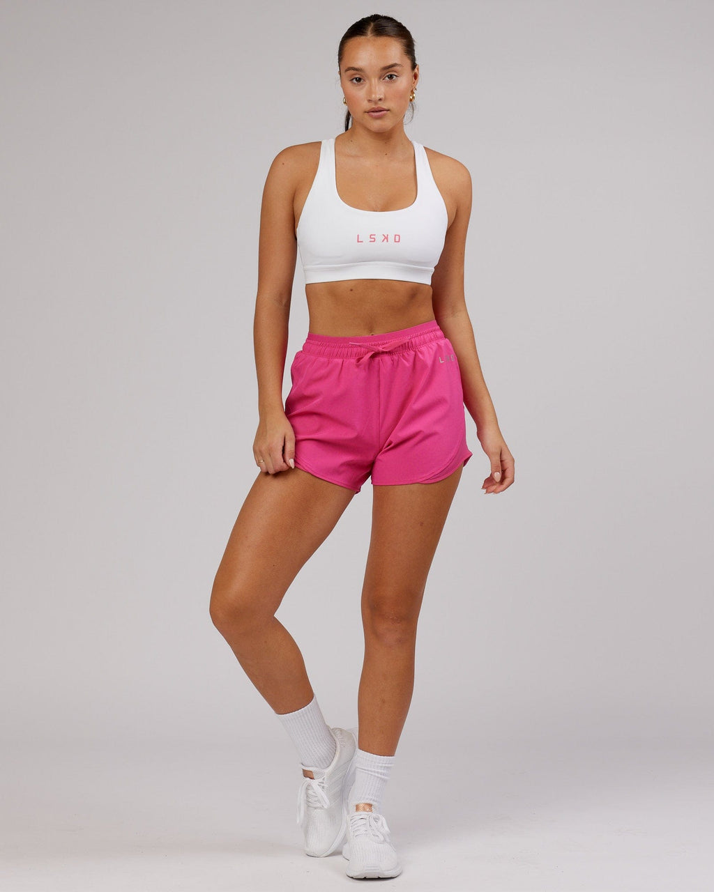 Model wearing Dynamic Run Short - Magenta