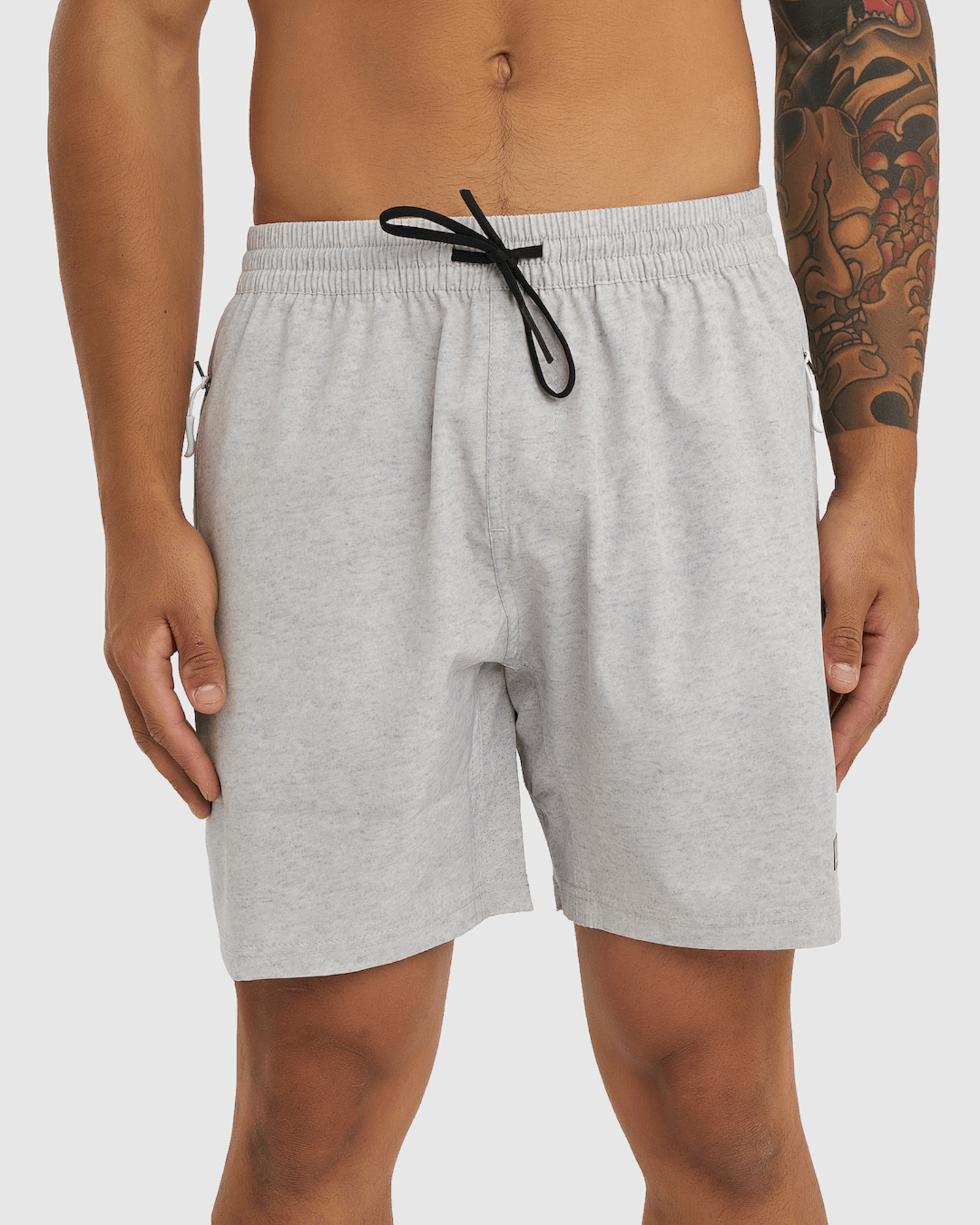 Model wearing Rep 7" Performance Short - Lt Grey Marl