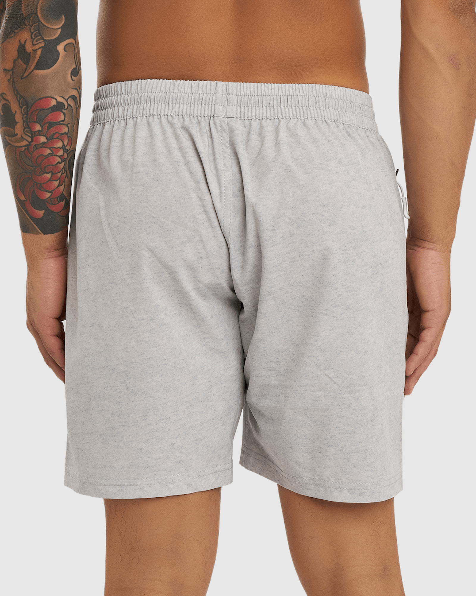 Model wearing Rep 7" Performance Short - Lt Grey Marl