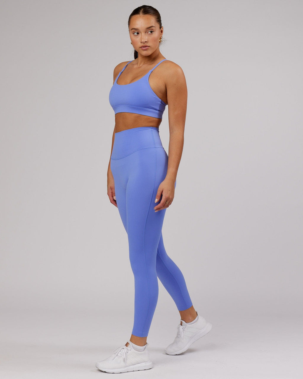 Model wearing Elixir 7/8 Length Tight - Indulgent Blue