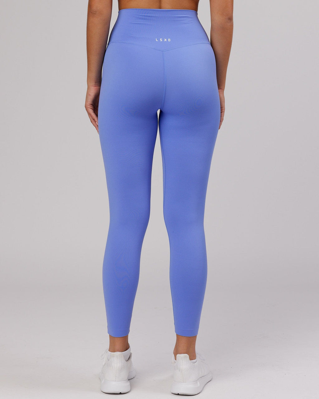 Model wearing Elixir 7/8 Length Tight - Indulgent Blue