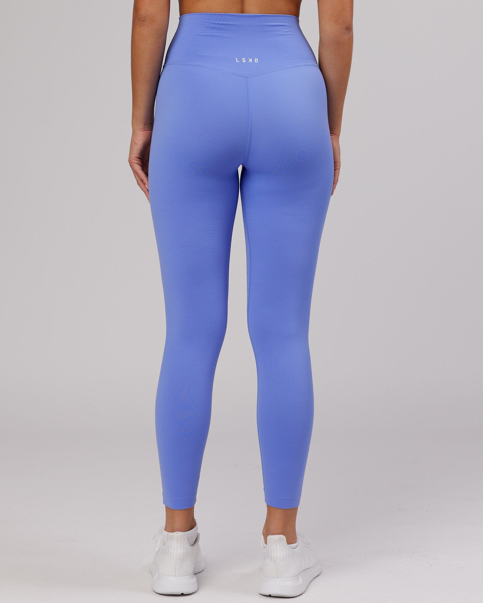 Model wearing Elixir 7/8 Length Tight - Indulgent Blue