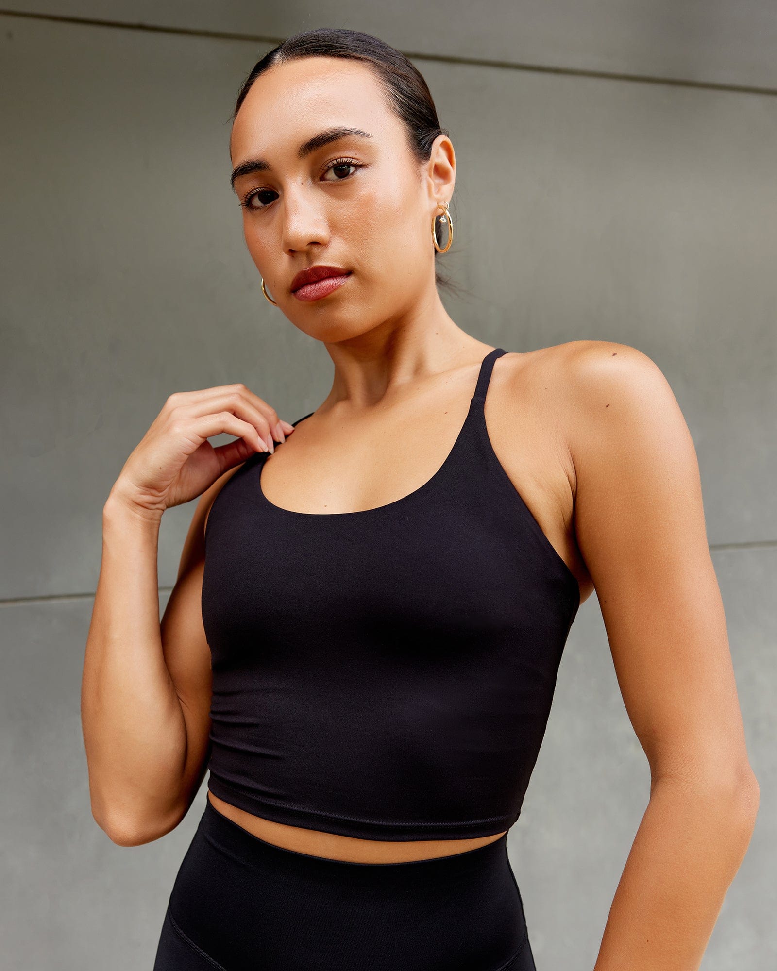 Model wearing Elixir Active Tank - Black