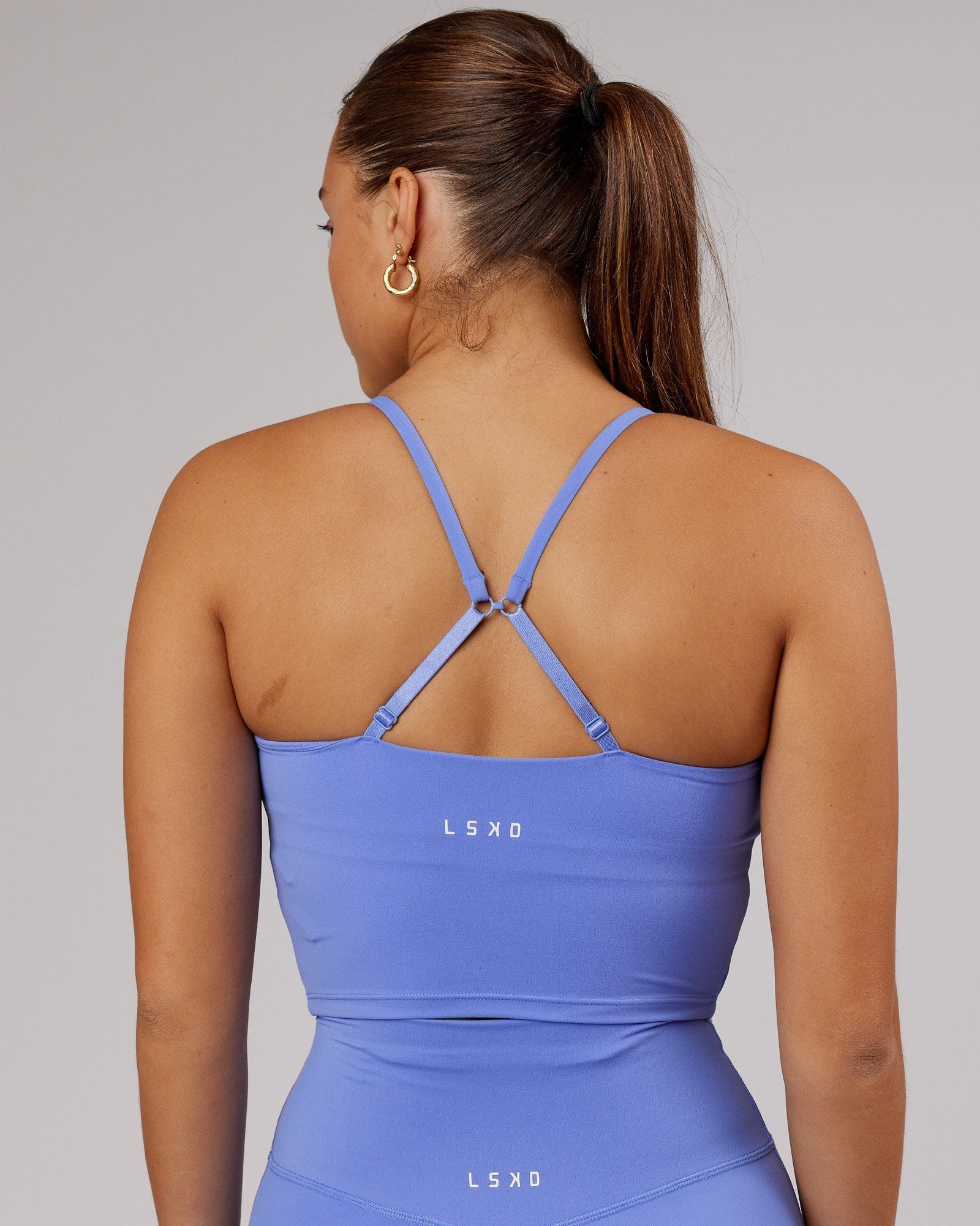 Model wearing Elixir Active Tank - Indulgent Blue