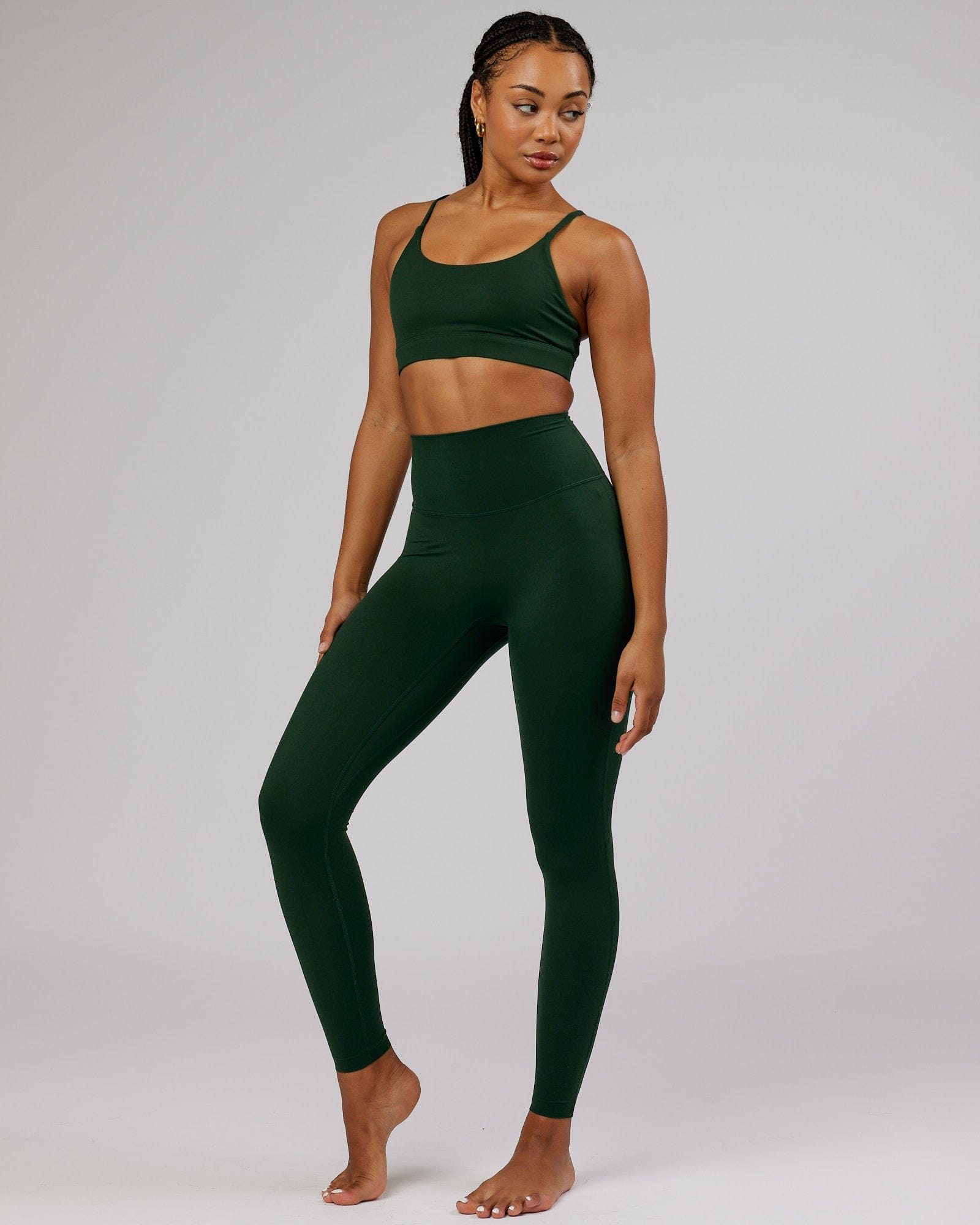 Model wearing Elixir Full Length Tight - Ivy Green