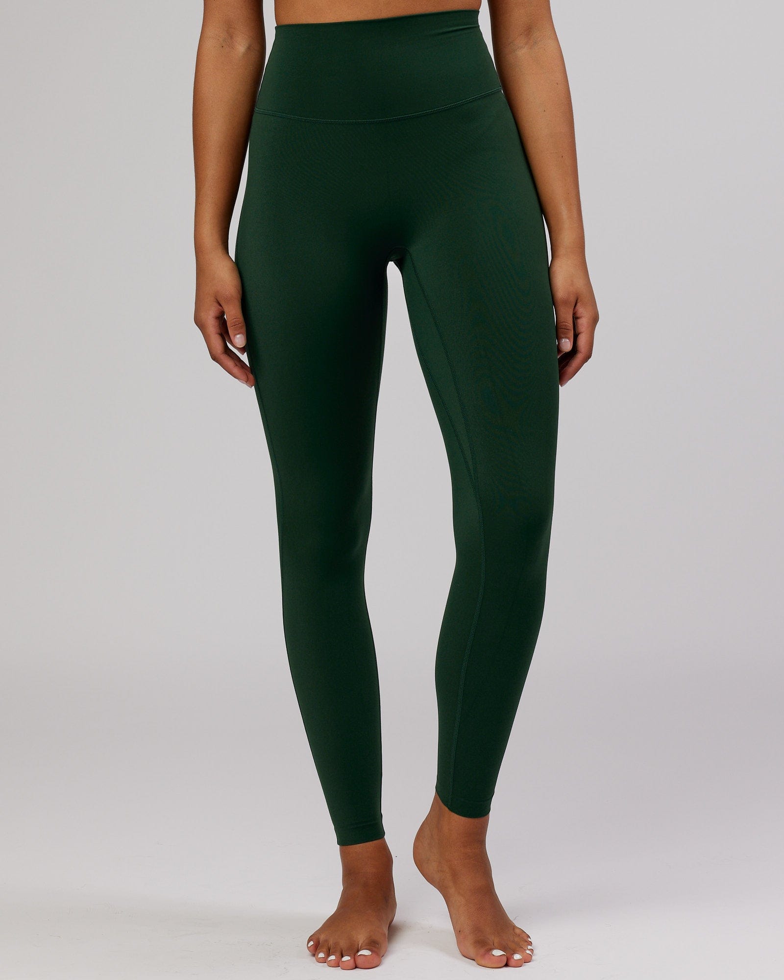 Model wearing Elixir Full Length Tight - Ivy Green