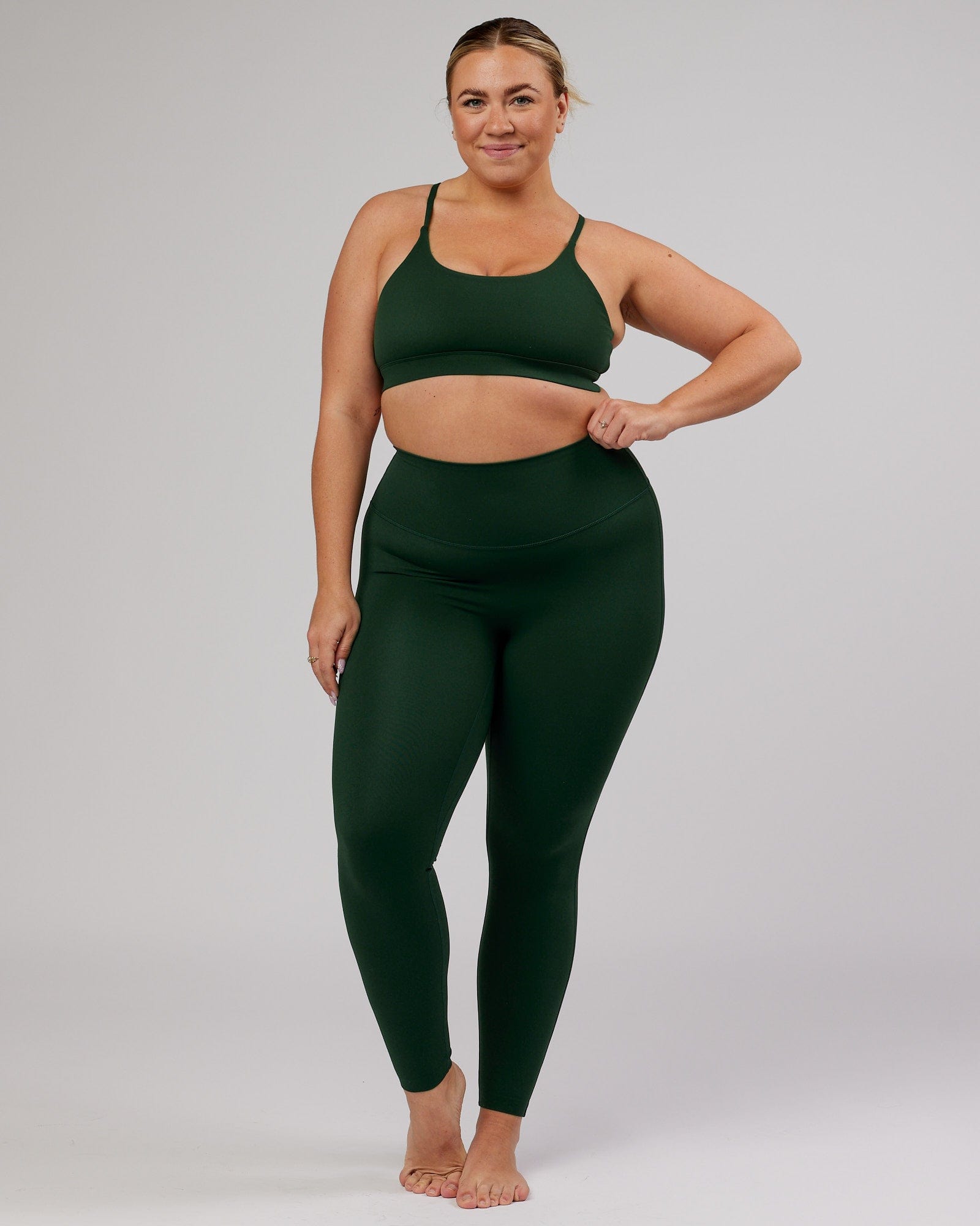 Model wearing Elixir Full Length Tight - Ivy Green