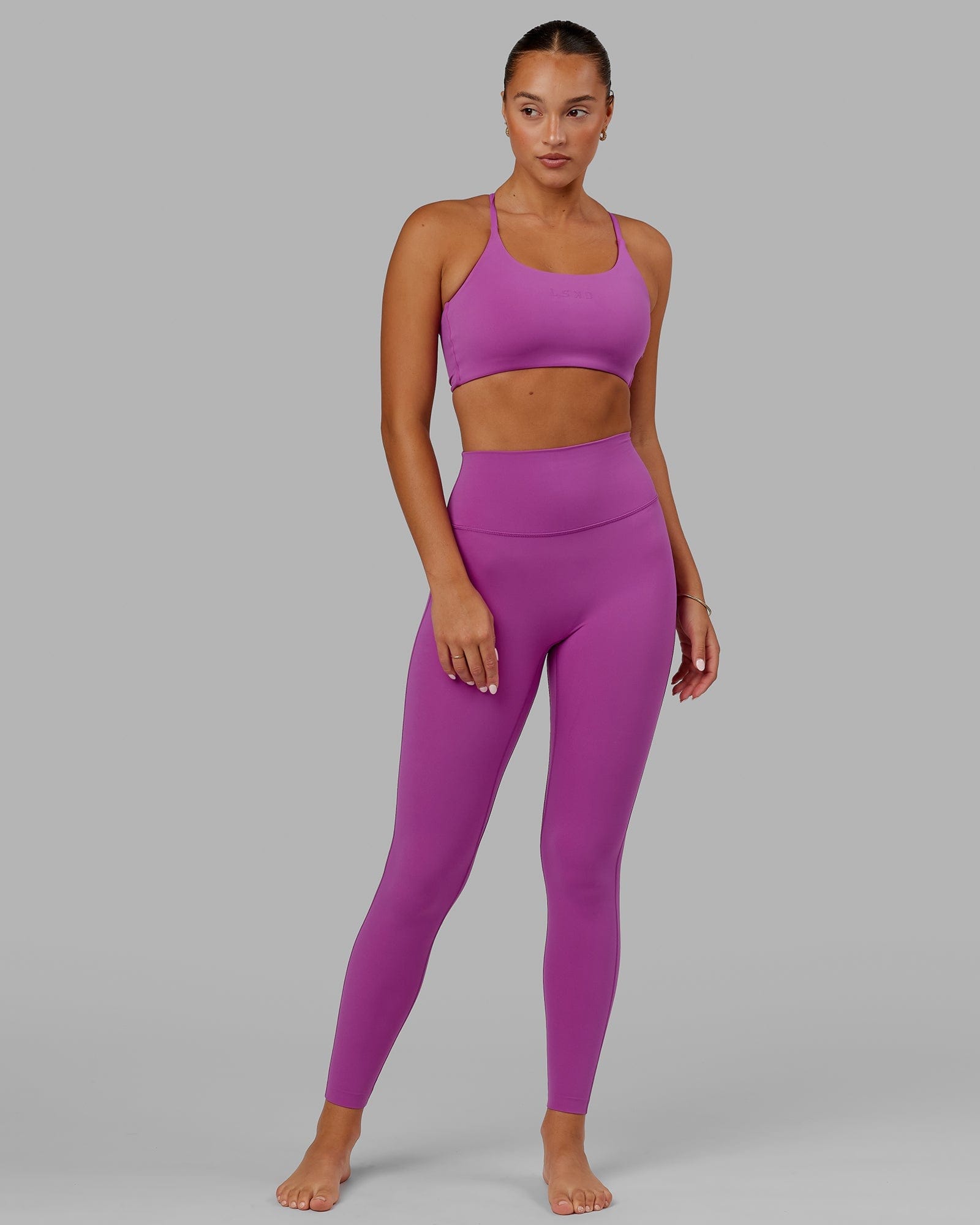 Model wearing Elixir Full Length Tight - Orchid