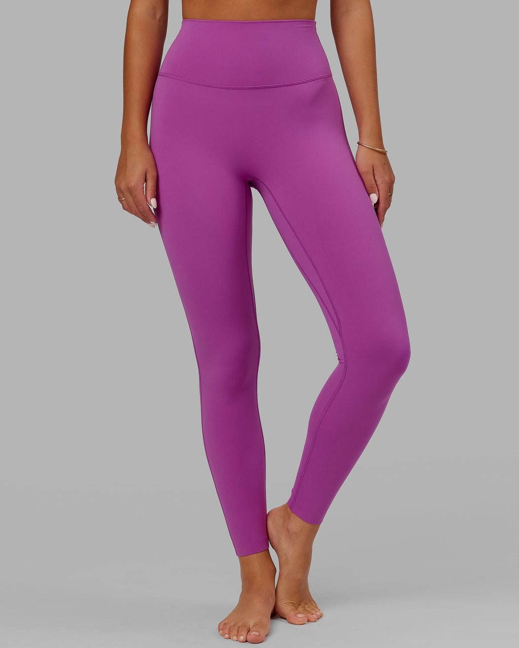 Model wearing Elixir Full Length Tight - Orchid