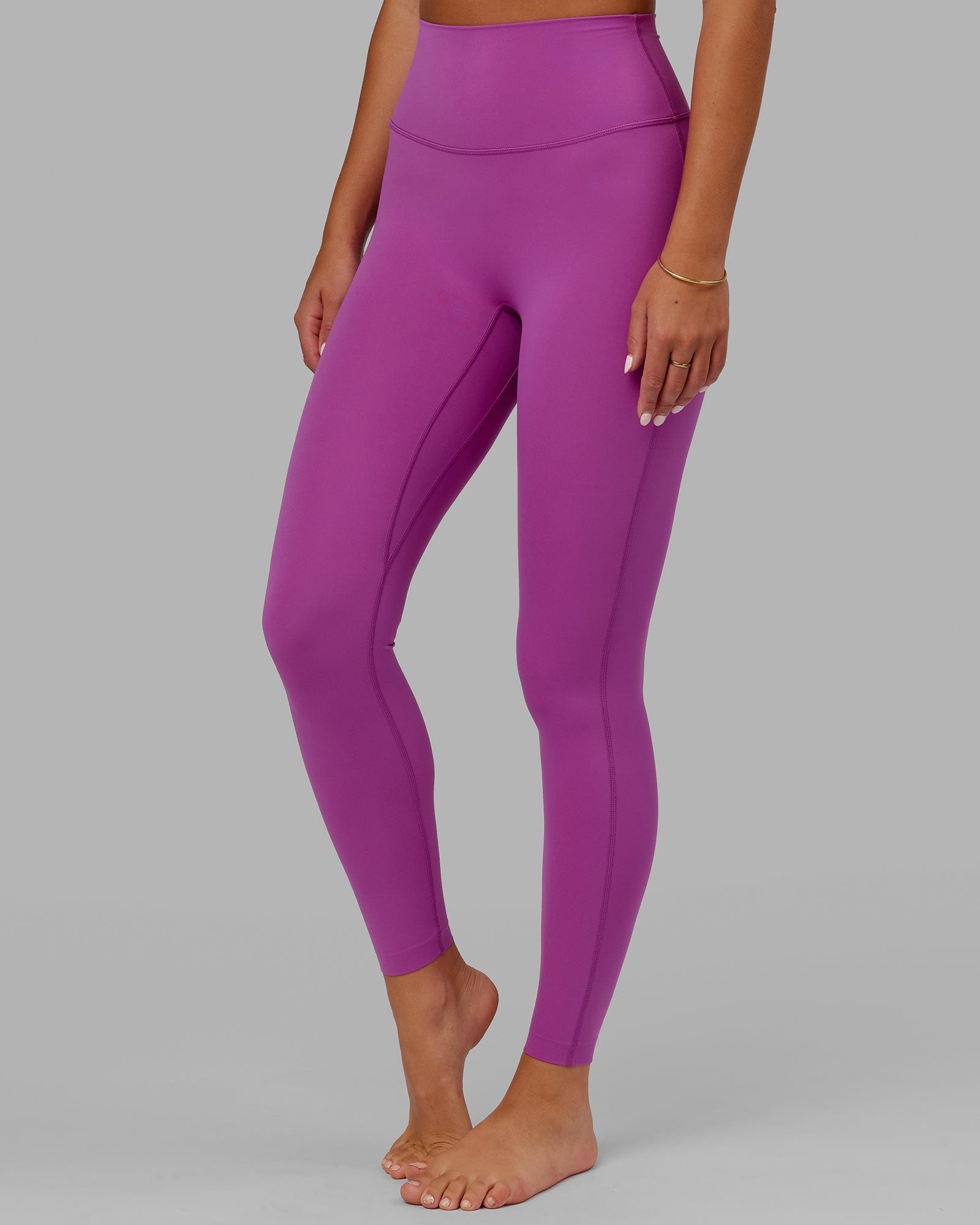 Model wearing Elixir Full Length Tight - Orchid