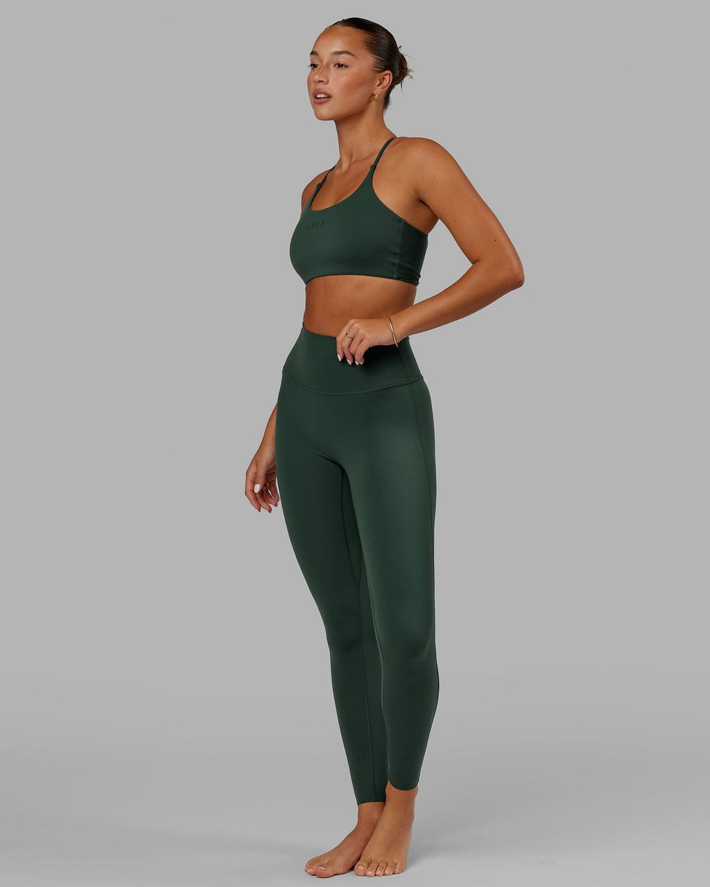 Model wearing Elixir Full Length Tight - Vital Green