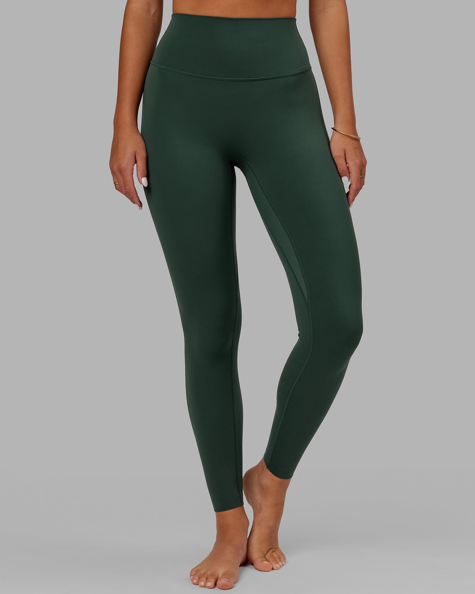 Model wearing Elixir Full Length Tight - Vital Green