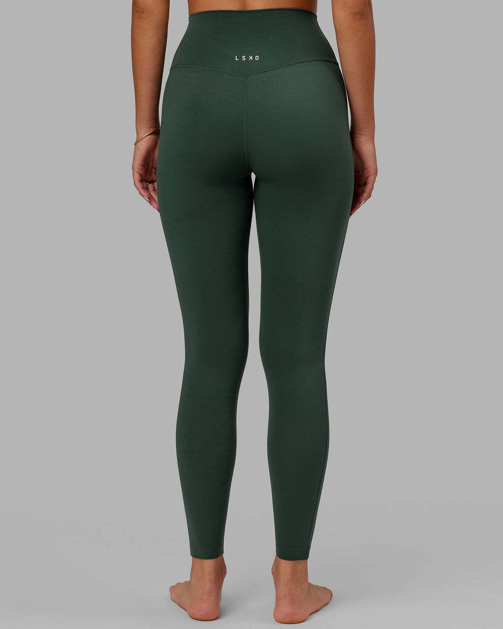 Model wearing Elixir Full Length Tight - Vital Green