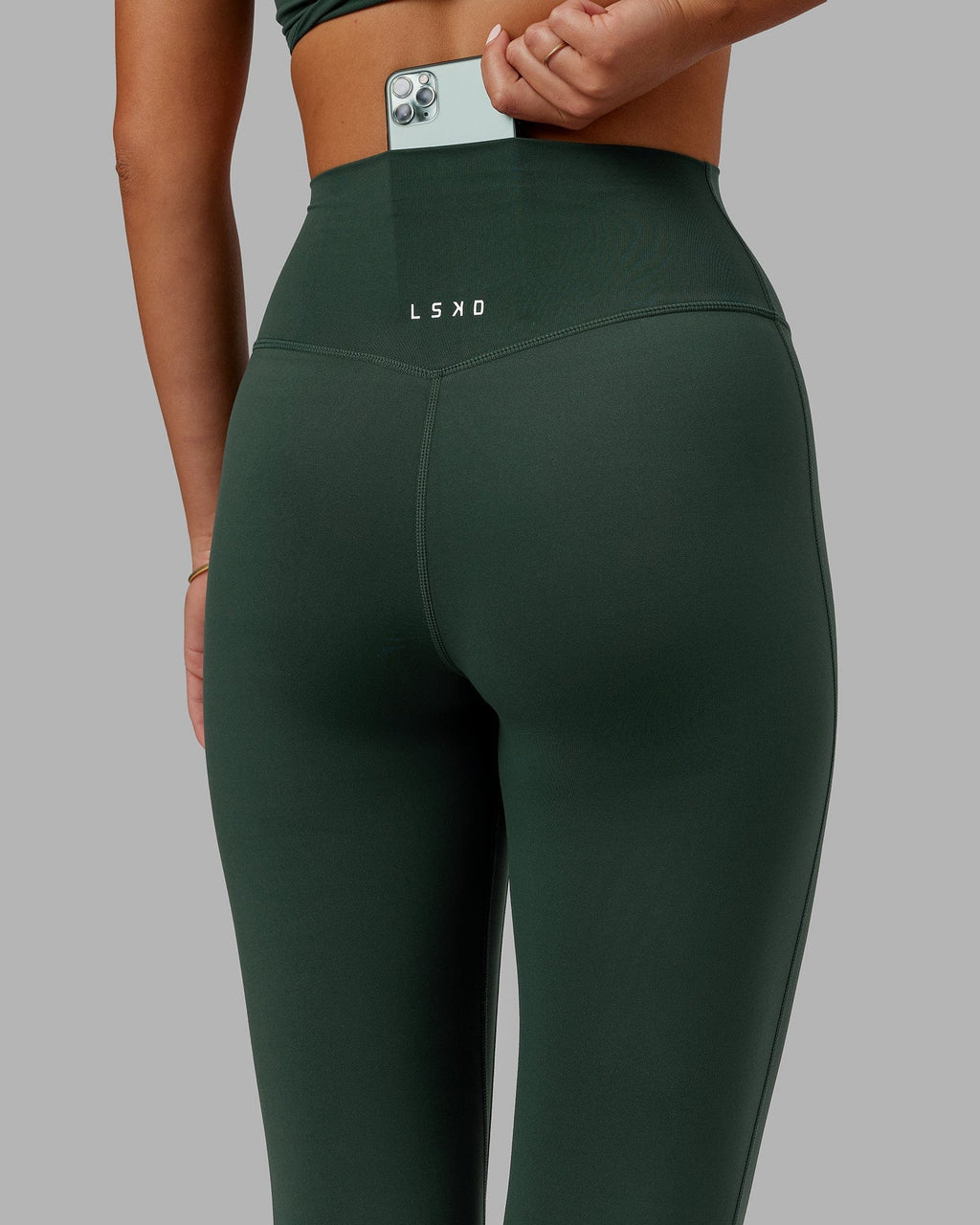 Model wearing Elixir Full Length Tight - Vital Green