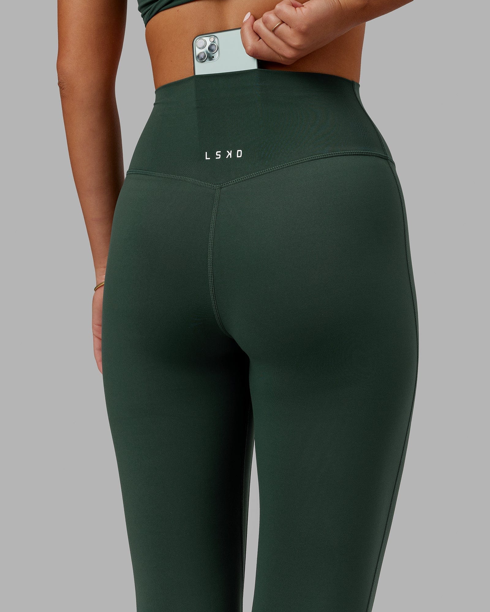 Model wearing Elixir Full Length Tight - Vital Green