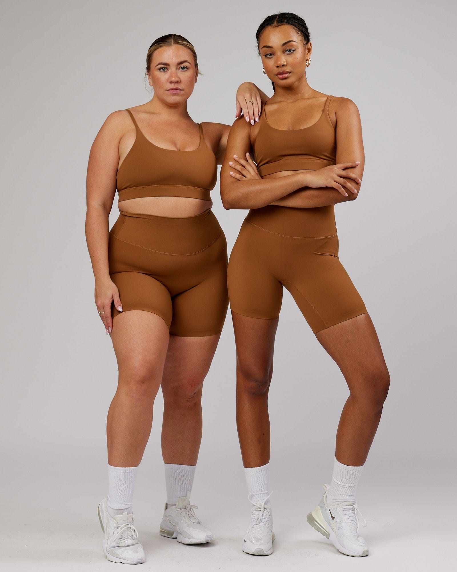 Model wearing Elixir Mid Short Tight - Camel