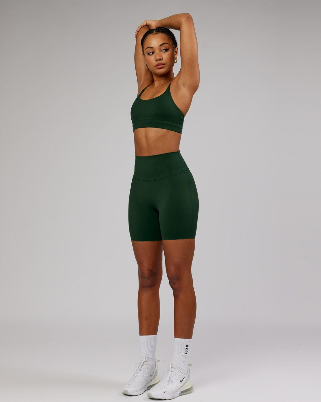 Model wearing Elixir Mid Short Tight - Ivy Green