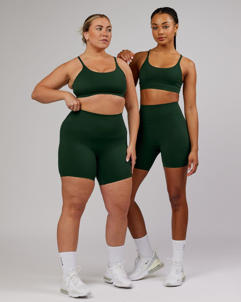 Model wearing Elixir Mid Short Tight - Ivy Green