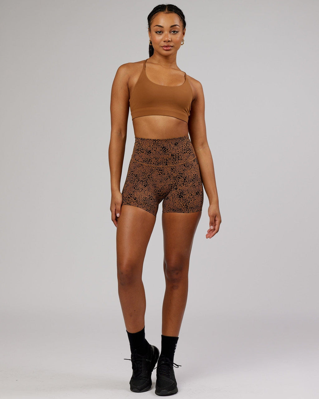 Model wearing Elixir Sports Bra - Camel