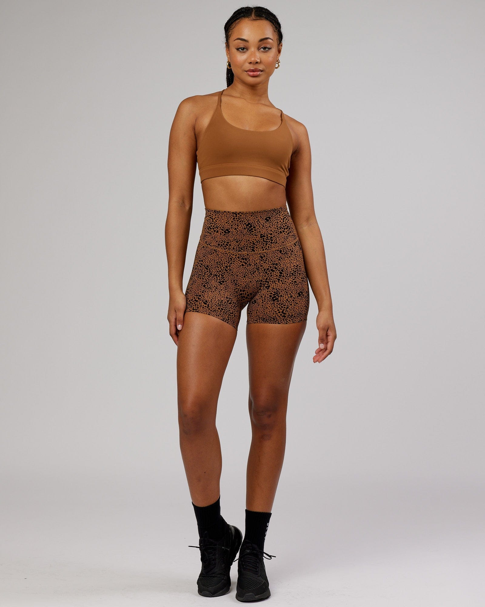 Model wearing Elixir Sports Bra - Camel