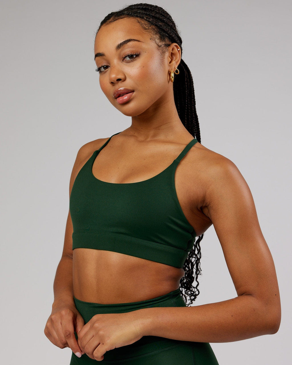 Model wearing Elixir Sports Bra - Ivy Green