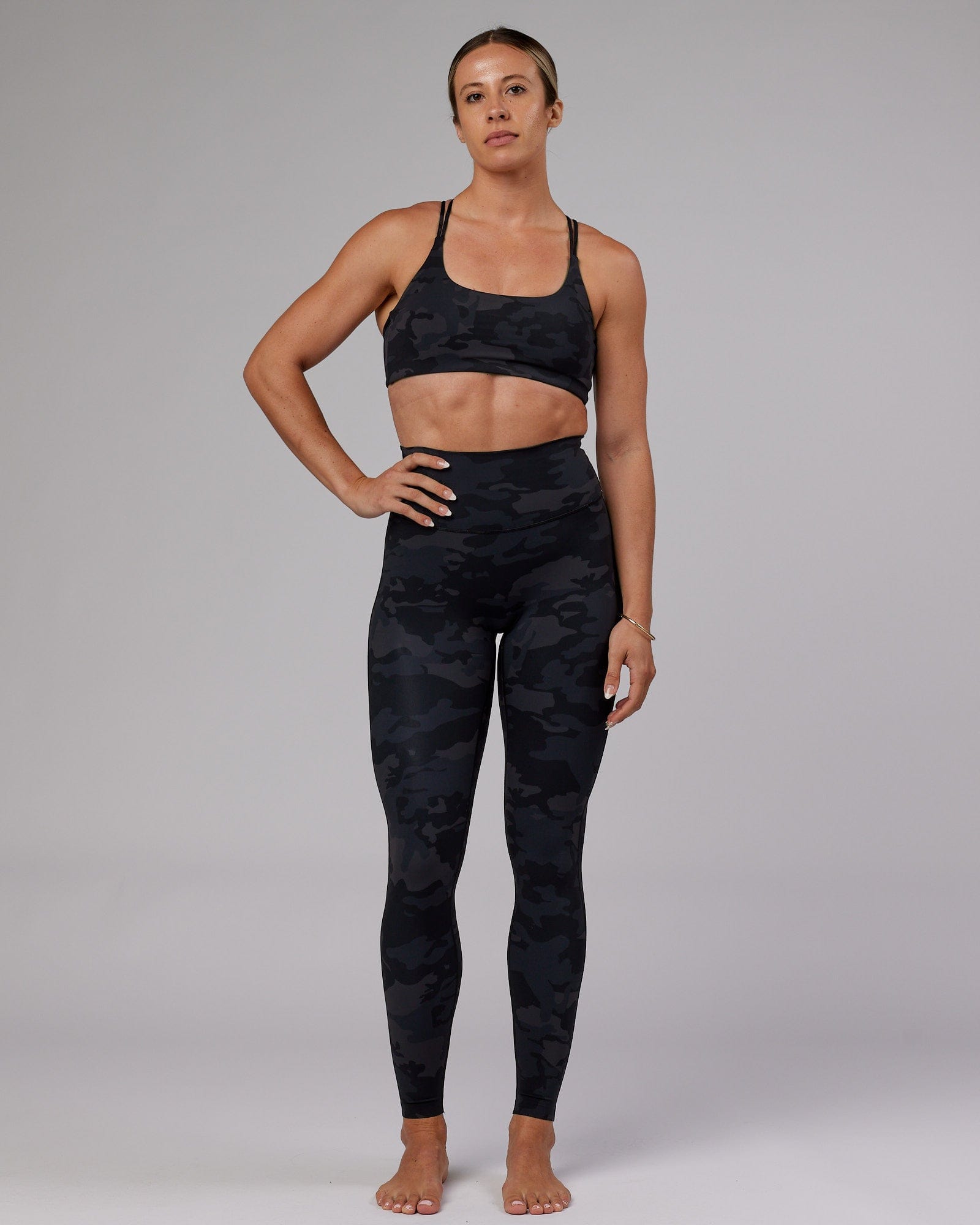 Model wearing Elixir X-Long Tight - Black Camo