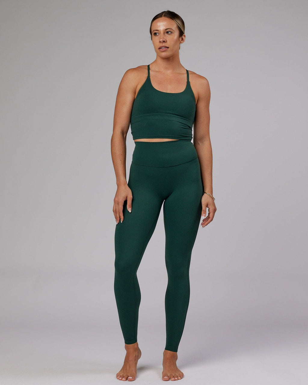 Model wearing Elixir X-Long Tight - Vital Green