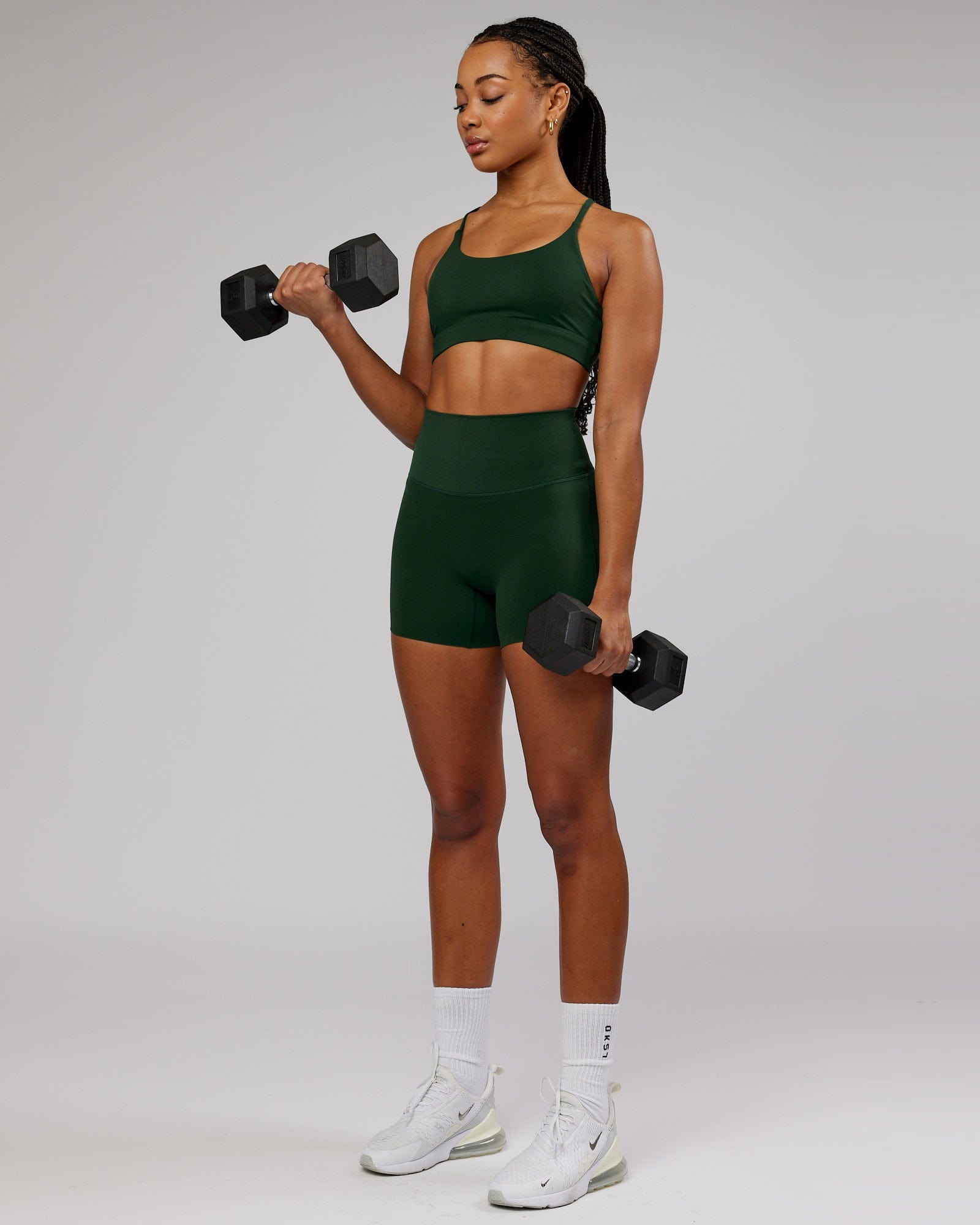 Model wearing Elixir X-Short Tight - Ivy Green