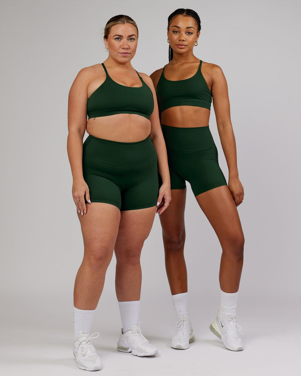 Model wearing Elixir X-Short Tight - Ivy Green