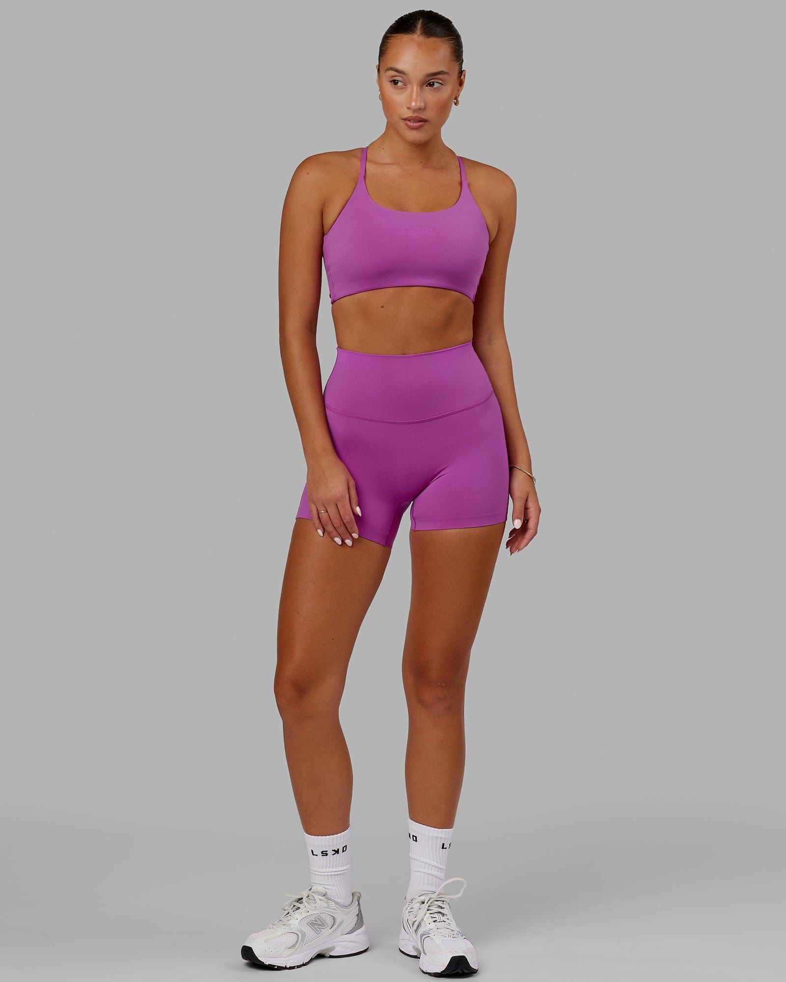 Model wearing Elixir X-Short Tight - Orchid