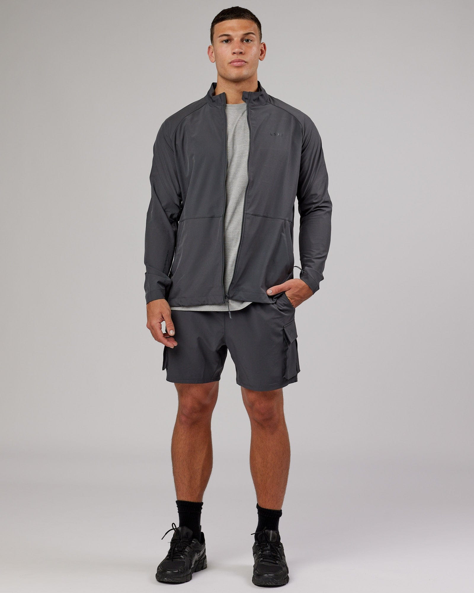 Model wearing Energy Stretch Performance Jacket - Asphalt