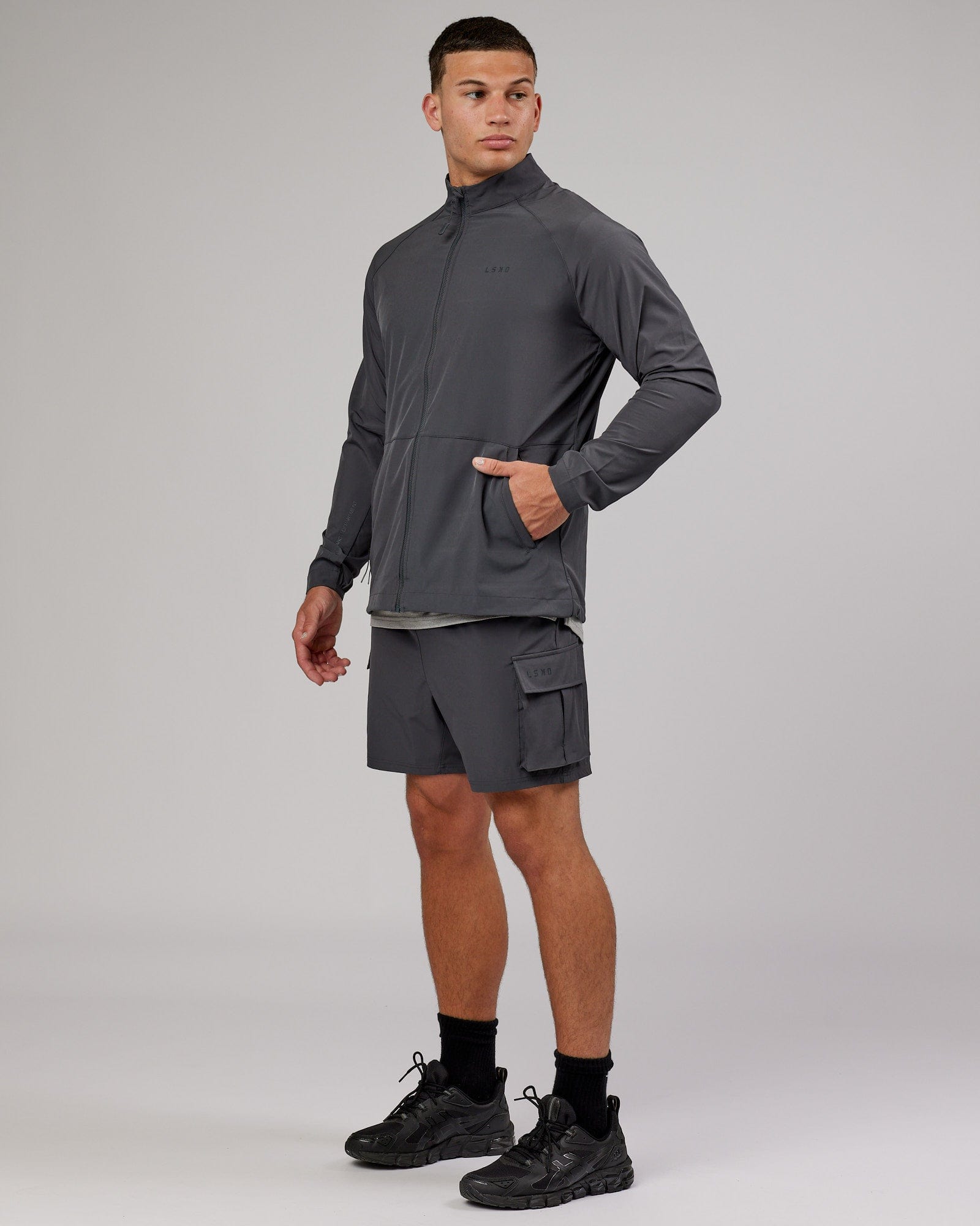 Model wearing Energy Stretch Performance Jacket - Asphalt