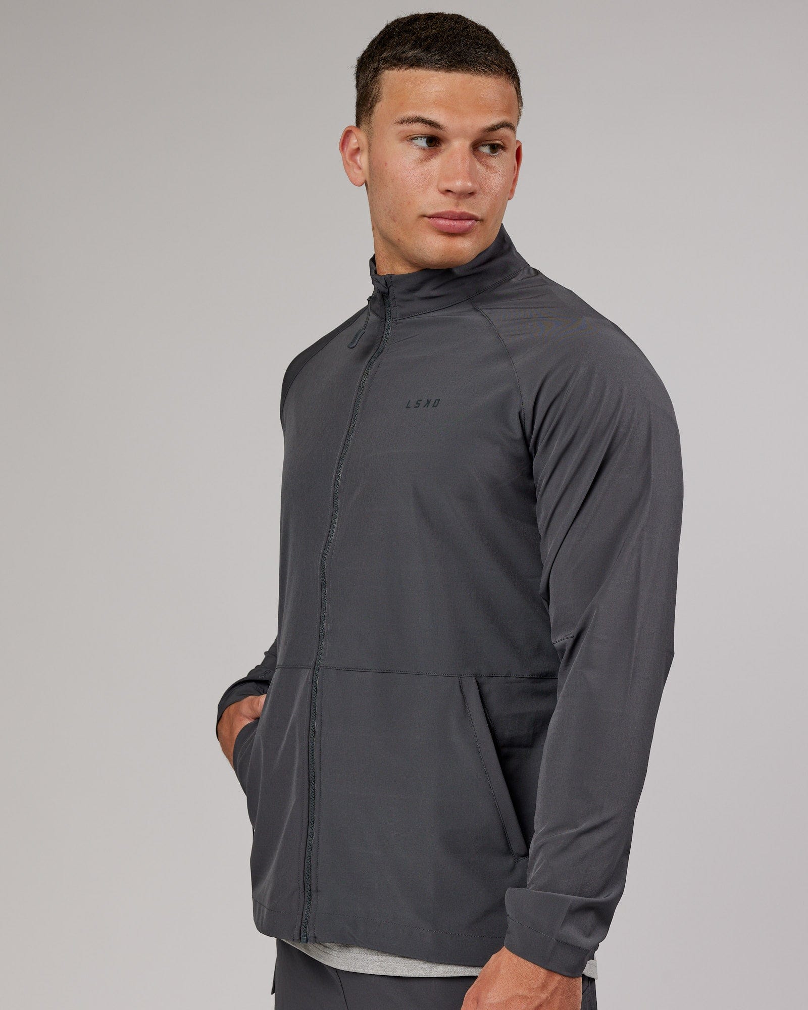 Model wearing Energy Stretch Performance Jacket - Asphalt