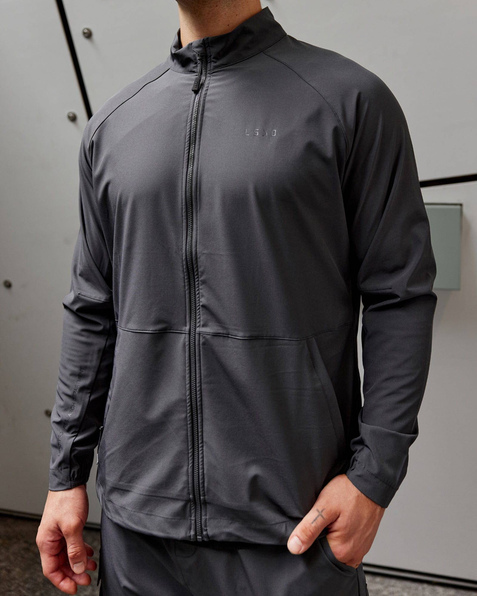 Model wearing Energy Stretch Performance Jacket - Asphalt