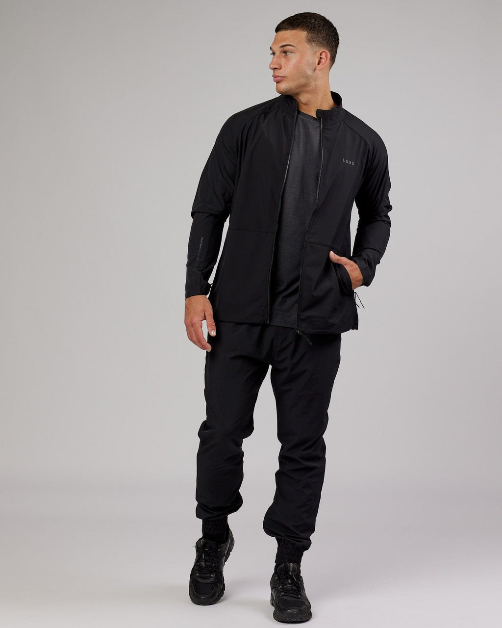 Model wearing Energy Stretch Performance Jacket - Black