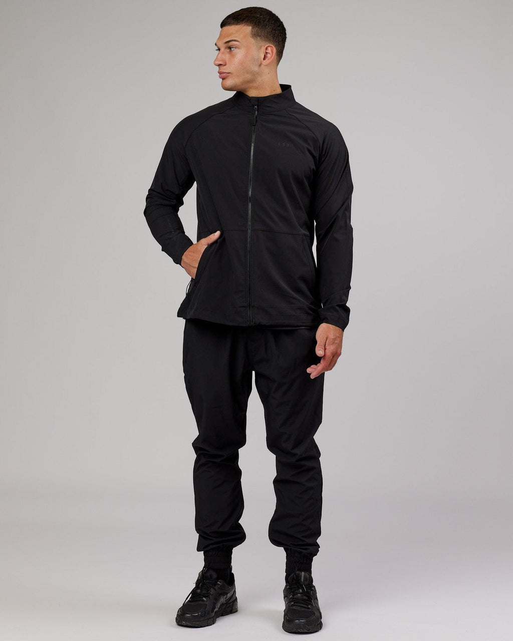 Model wearing Energy Stretch Performance Jacket - Black