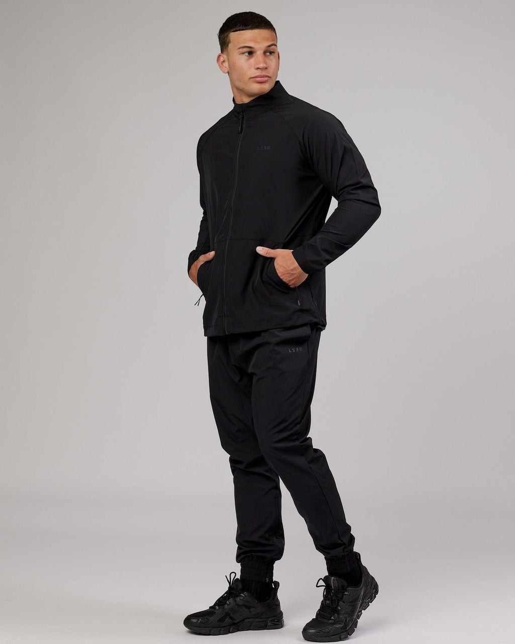 Model wearing Energy Stretch Performance Jacket - Black