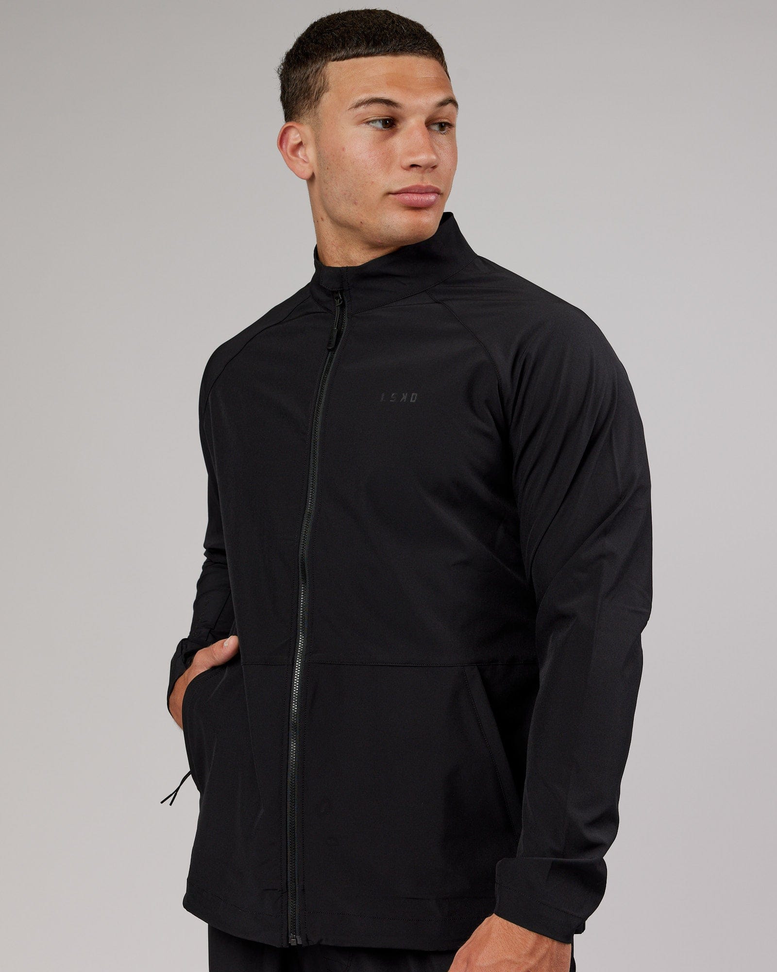 Model wearing Energy Stretch Performance Jacket - Black