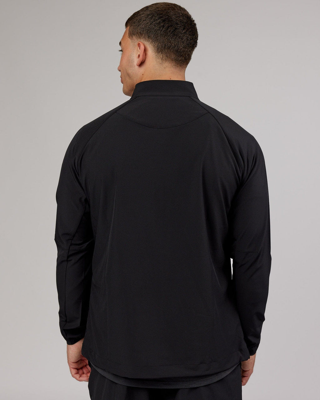 Model wearing Energy Stretch Performance Jacket - Black