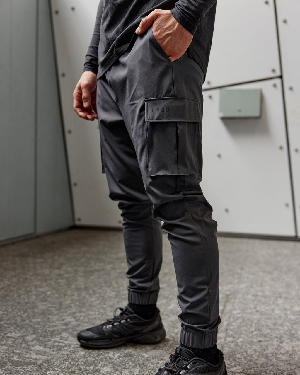 Model wearing Energy Stretch Performance Cargo Jogger - Asphalt